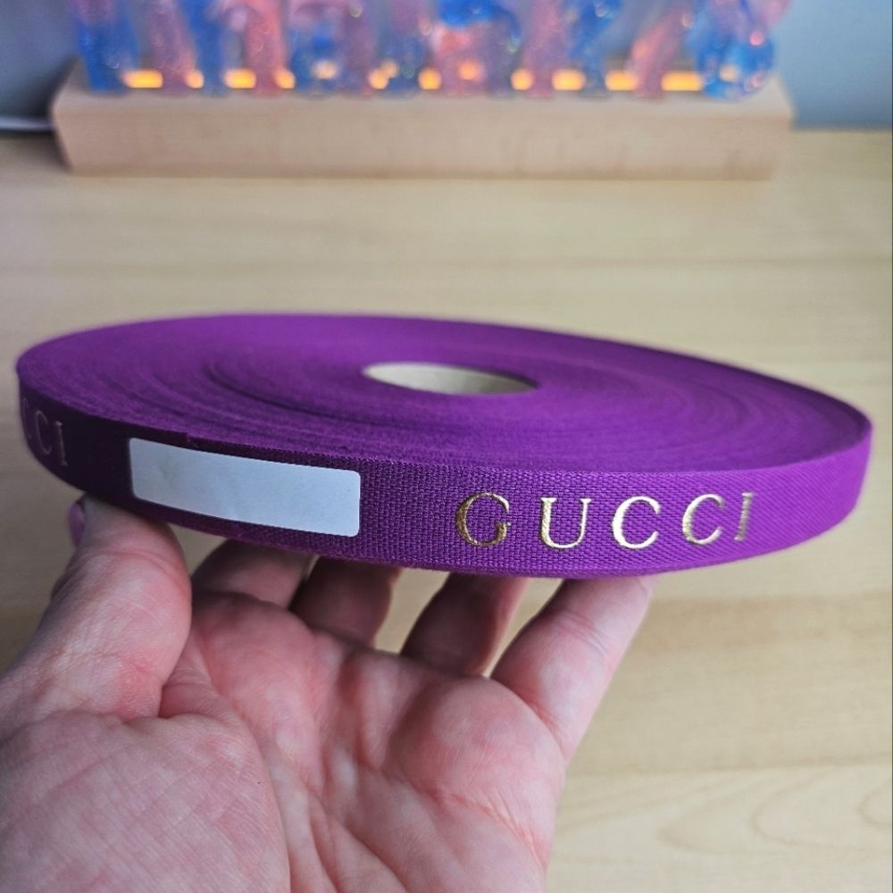 Gucci Purple Ribbon with Gold Font - 1 New Roll